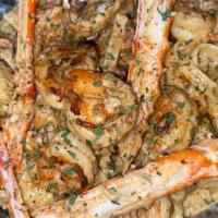 Seafood Pasta · Crab and Colossal Shrimp simmered in a Cajun cream sauce over fettuccine.