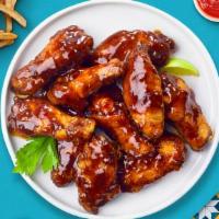 Gladiator Soy Garlic Wings · Fresh chicken wings breaded, fried until golden brown, and tossed in soy garlic sauce. Choic...