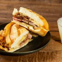 The Cubano · Slow-braised & pulled pork shoulder, smoked ham, Swiss cheese, pickles, dijonnaise, toasted ...