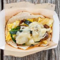 Jack And Beef · Scrambled eggs, sirloin, roasted poblano onion rajas, Jack cheese.