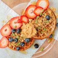 Protein Waffle · Protein infused waffle sliders, topped with brown rice syrup, strawberries, blueberries, hem...