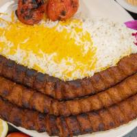 Koobideh Beef · Three skewers of ground beef kabob, broiled over open flames, served with basmati rice and b...