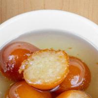 Gulab Jamun (Milk Balls In Rose) · Flavored sugar syrup with a touch of cardamom.
