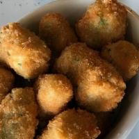 Fried Okra Bites · Fresh fried Okra bites with Panko bread crumbs served with a side of homemade remoulade  sau...