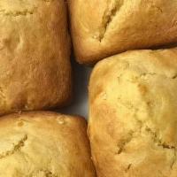 Corn Bread Basket · Four pieces of homemade corn bread with corn kernels