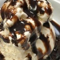 Ghirardelli Brownie  Ala Mode · Warm Ghirardelli brownie with chocolate sauce and a scoop of vanilla ice cream