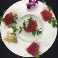 Tuna Lover · 4 pieces sushi, 4 pieces sashimi and spicy tuna roll.