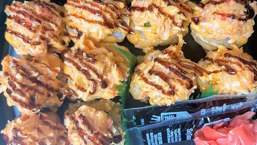 Spicy Crabmeat Crunch · Deep fried tempura sushi rolls with spicy crabmeat on top.