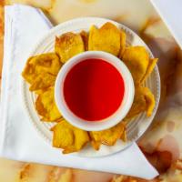 Crab Rangoon (8) · 8 pieces. comes with small sweet and sour sauce.