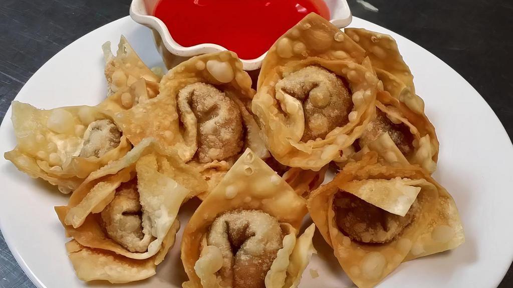 Fried Wonton (12) · 12 pieces. comes with small sweet and sour sauce.