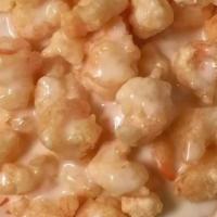Coconut Shrimp · Gluten-Free. Deep fried golden shrimp topped with mouth watering white creamy coconut flavor...