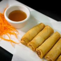 Crispy Spring Rolls · Egg roll wrapped with mixed vegetables and deep fried and served with plum sauce.