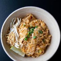 Phad Thai · Stir-fried rice noodle with egg, bean sprouts, cabbage, scallions served with ground peanut,...