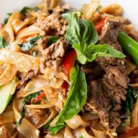 Drunken Noodle · Stir fried flat noodle with egg, onions, Chinese broccoli, Thai basil, serrano, bell pepper