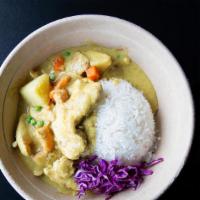 Yellow Curry Stir Fry · stir fried with egg, onion, bell pepper, napa cabbage, baby bok choy, scallion in coconut ye...