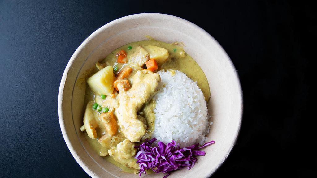 Yellow Curry Stir Fry · stir fried with egg, onion, bell pepper, napa cabbage, baby bok choy, scallion in coconut yellow curry,  served with jasmine rice