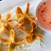 Cream Cheese Wontons (6) · with sweet and sour sauce