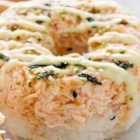 Crabmeat Donut · Crabmeat donut with eel sauce, spicy mayo, and wasabi mayo. Topped w/ wasabi furikake.