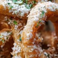 Beer Battered Onion Rings · Hand Battered, Parmesan, Housemade Ranch