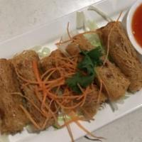 Eggs Rolls (4 Pieces) · Crispy fried spring rolls filled with mixed vegetables and glass noodles.