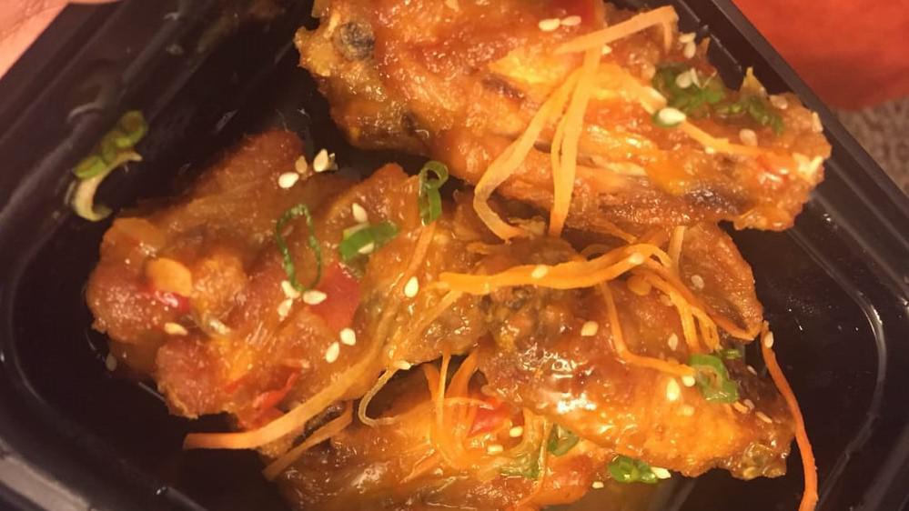 Noodle Bar Chicken Wings (5 Pieces) · Our signature chicken wings with special sauce.
