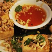 Golden Tofu (5 Pieces) · Fried tofu. Served with sweet chili, nuts, and green onions homemade sauce.
