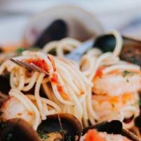 Seafood Diablo · Shrimp, scallop, mussels & calamari in a spicy pomodoro sauce over linguini pasta