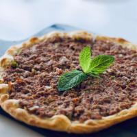Meat Manoush · Meat (ground beef, onions, and tomatoes) on a Lebanese flatbread (manoush).