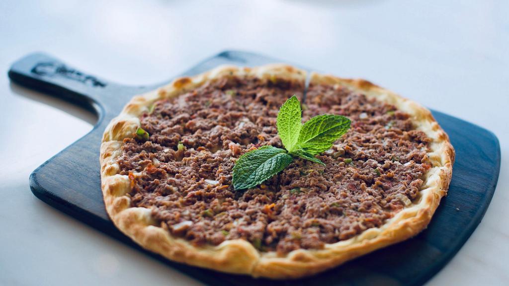 Meat Manoush · Meat (ground beef, onions, and tomatoes) on a Lebanese flatbread (manoush).