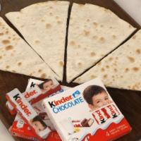 Kinder Sajj · Authentic Lebanese thin bread (sajj) filled with Kinder chocolate  and baked on a convex met...