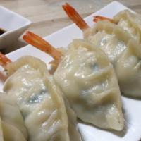 Shrimp Dumpling 새우만두 · Steamed shrimp and vegetable dumplings (5pcs)