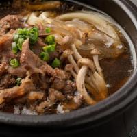 Bulgogi Soup 뚝배기 불고기 · Stew with bulgogi, scallion & noodle