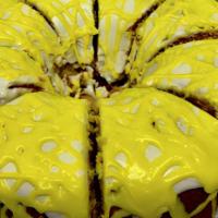 Homemade Lemon Cake Slice · Velvety, moist and delicious! Topped with cream cheese icing and soaked with lemon syrup.