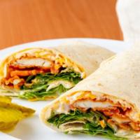 Buffalo Chicken Ranch Wrap · Crispy chicken tossed in buffalo sauce with lettuce, tomato, cheddar cheese and ranch dressi...