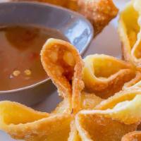 Cheese Wonton · Home made crab cheese wonton served with fruity sweet & sour sauce