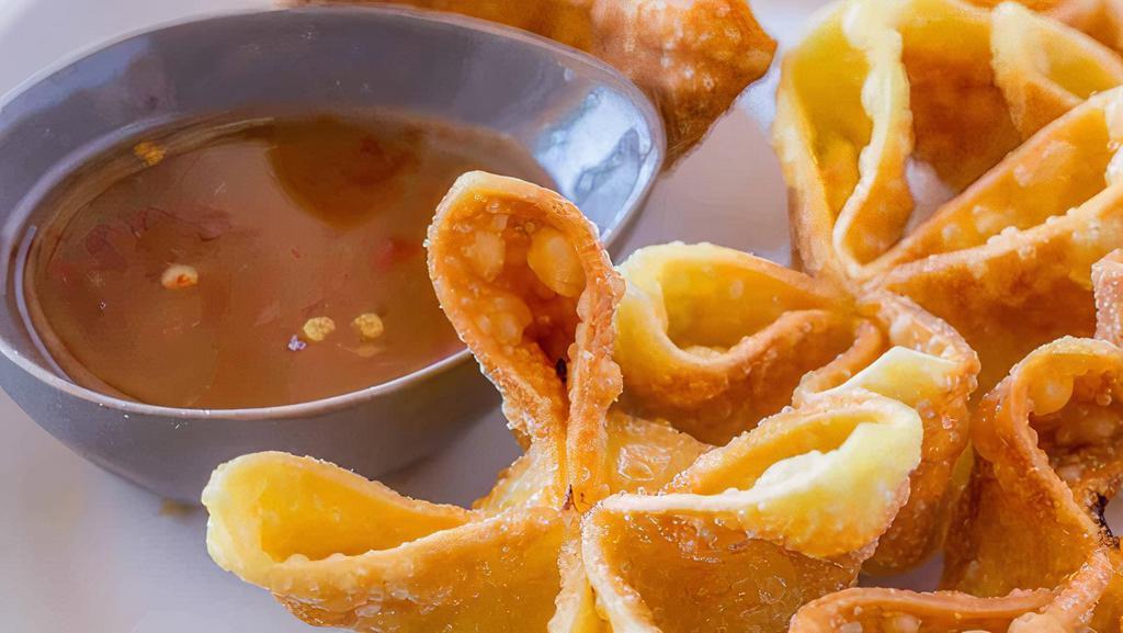 Cheese Wonton · Home made crab cheese wonton served with fruity sweet & sour sauce