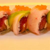 Mermaid Roll · Tuna, salmon, cream cheese and mango inside, yellowtail, avocado,and tobiko on top.