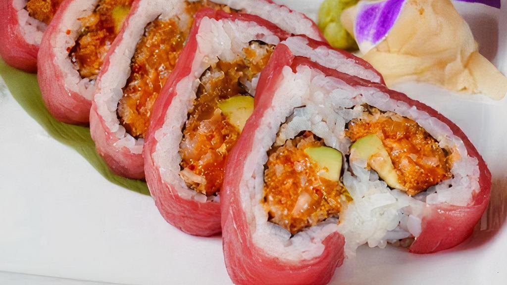 Sweetheart Roll · Spicy tuna, crunch, and avocado inside, wrapped with soybean paper, and tuna on top.