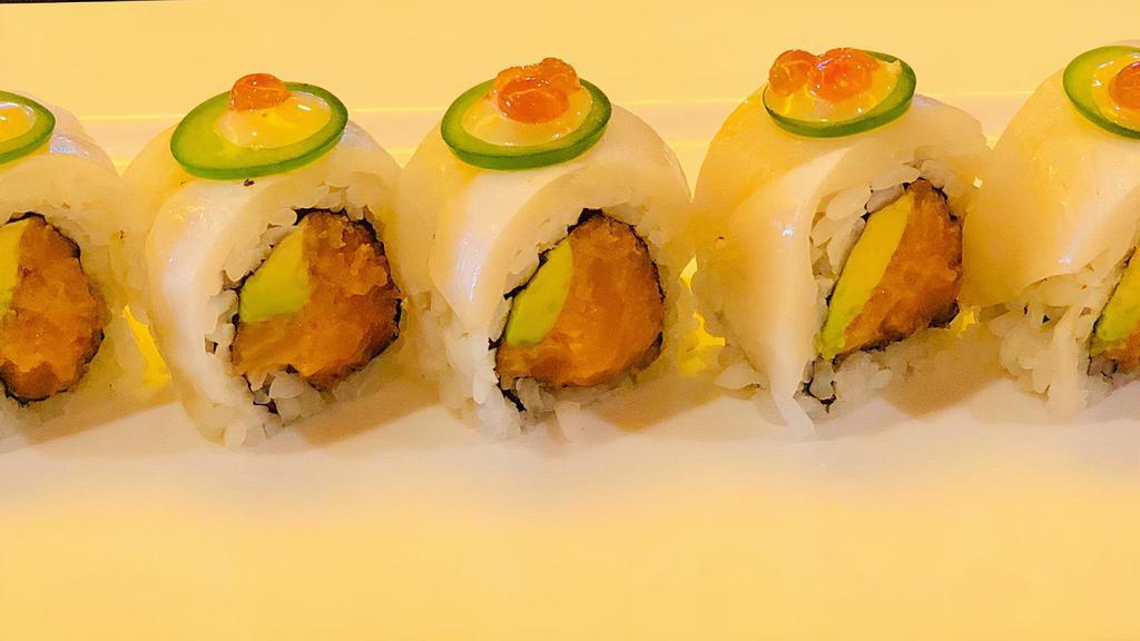 Rattlesnake Roll · Spicy salmon inside, white tuna, jalapeño, and salmon roe on top with wasabi mayo, and ponzu sauce.