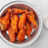 Fried Chicken Wings · A generous portion of wings served with your choice of wing sauce and ranch or blue cheese