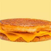 Grilled Cheese · EXTRA Melted Cheddar Cheese On A Buttery Toasted Bun.