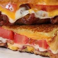 Grilled Cheese, Bacon & Tomato · Bacon, cheese (choice) and tomato on choice of bread.