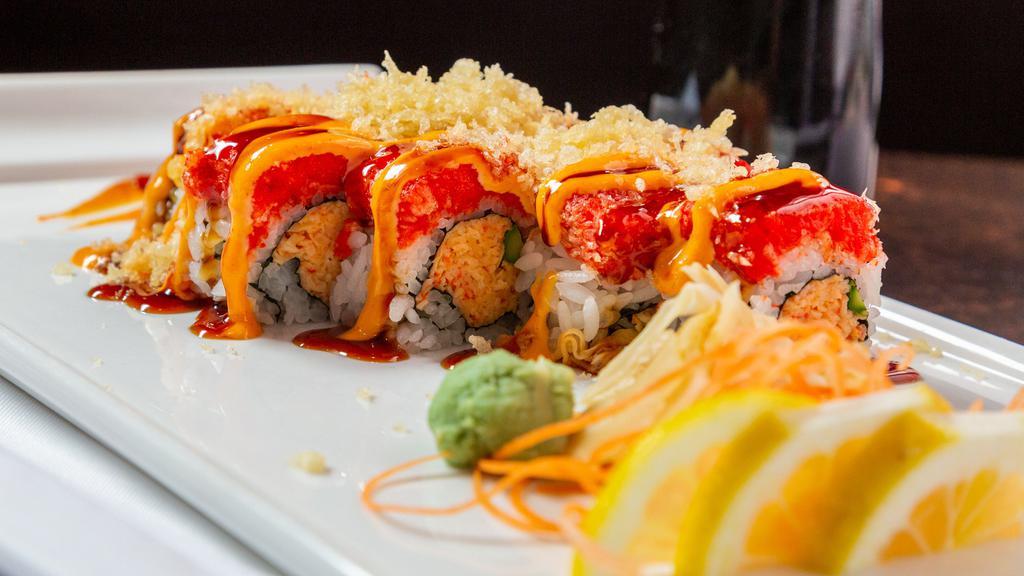 Izumi Roll · Asparagus, spicy crab and crunchy inside, top with spicy tuna and eel sauce and spicy mayo sauce.
