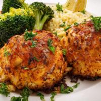 Crab Cakes · Two (4 oz) broiled crab cakes made with jumbo lump Maryland crab served with rice and vegeta...