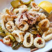 Pepper Calamari  · Spicy. Lightly breaded and flash fried, tossed with a pepper medley and a sweet zestful sauce.