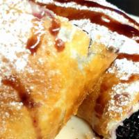 Blueberry Burrito · Flour tortilla filled with blueberry pie filling and fried to golden perfection. Served with...