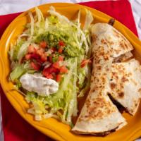 Quesadilla Deluxe · A folded and grilled flour tortilla, stuffed with cheese and your choice of grilled chicken,...