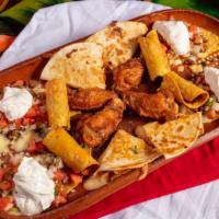 Toltecos Sampler · A combination of chicken wings, beef flautas, chicken quesadilla and chicken or ground beef ...
