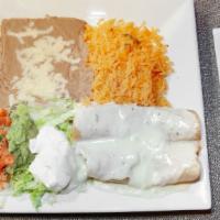 Chimichanga Especial · One flour tortilla, rolled up (fried or soft) and filled with your choice of beef, chicken, ...