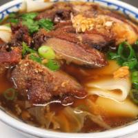 Duck Noodle Soup · Steamed wide rice noodles with sliced crispy duck and bean sprouts in duck broth. (a favorit...